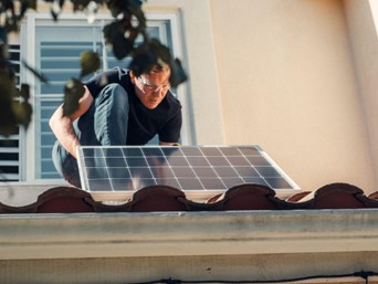 Should policymakers promote community solar PV systems in cities?